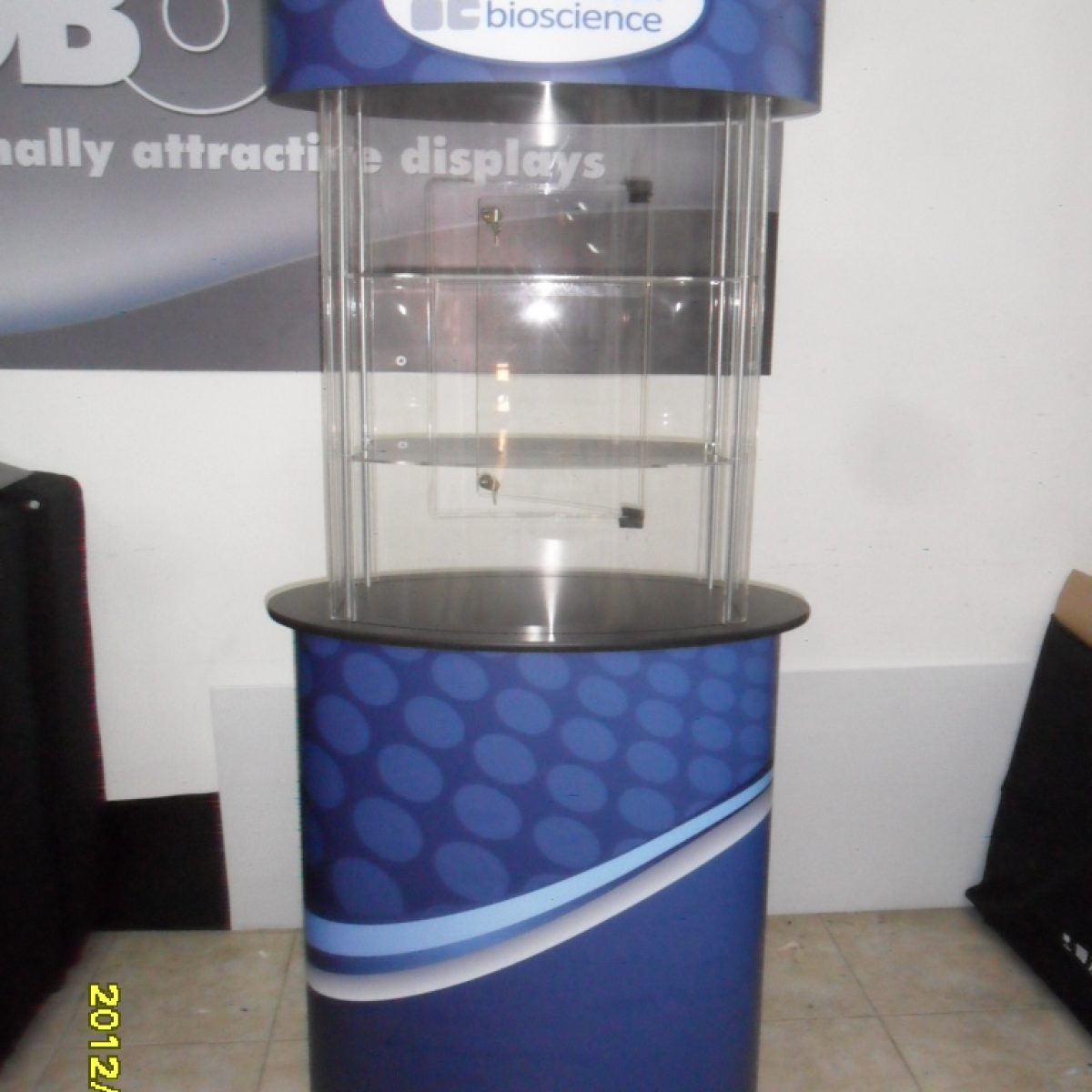 9) Circular Glass Kiosk